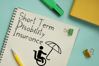 Notebook with "Short Term Disability Insurance" text and disability icon, related to post office short term disability.
